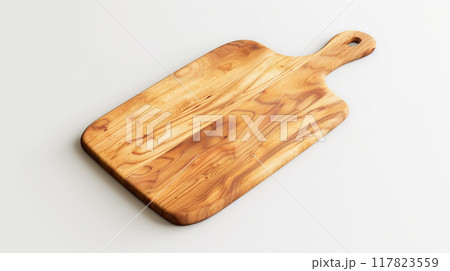 Traditional wood cutting board with handle, perfect for rustic kitchen settings and food styling 117823559