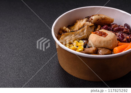 A colorful vegetarian dish consists of fish, beans, corn, mushrooms A colorful vegetarian dish consists of fish, beans, corn, mushrooms 117825292
