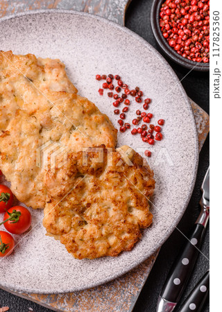 Delicious fried pork or chicken chops breaded with salt and spices Delicious fried pork or chicken chops breaded with salt and spices 117825360
