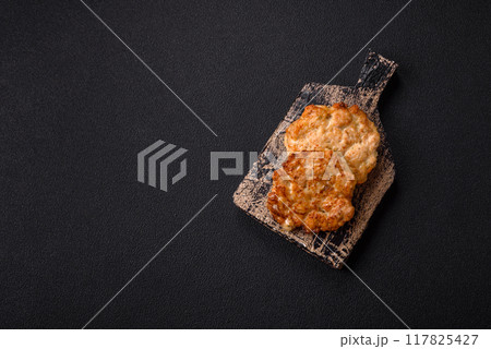 Delicious fried pork or chicken chops breaded with salt and spices Delicious fried pork or chicken chops breaded with salt and spices 117825427
