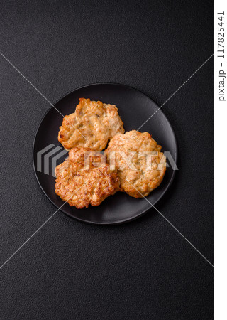 Delicious fried pork or chicken chops breaded with salt and spices 117825441