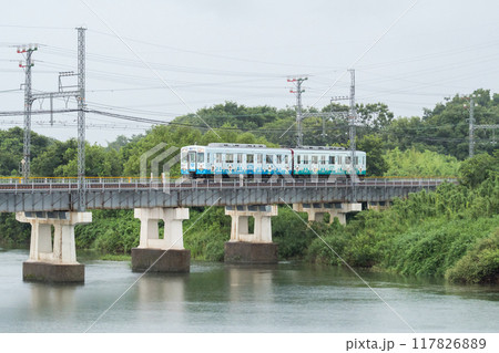 【山田線】雨の櫛田川を渡る普通列車 117826889