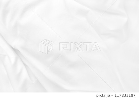 Close up top view of white bedding sheet and wrinkle messy blanket in bedroom after wake up in the morning. Close up top view of white bedding sheet and wrinkle messy blanket in bedroom after wake up in the morning. 117833187