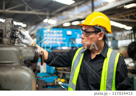 Operational level employees worker man wearing uniform safety and hardhat 117834413