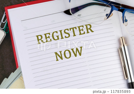 REGISTER NOW words written in the notebook of a businessman, a top manager, a manager REGISTER NOW words written in the notebook of a businessman, a top manager, a manager 117835893