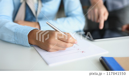 Businessmen make up a strategy, write down a list of options 117841550