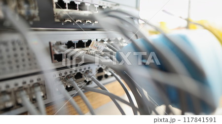 Server switch panel, patch cord connection, close-up Server switch panel, patch cord connection, close-up 117841591