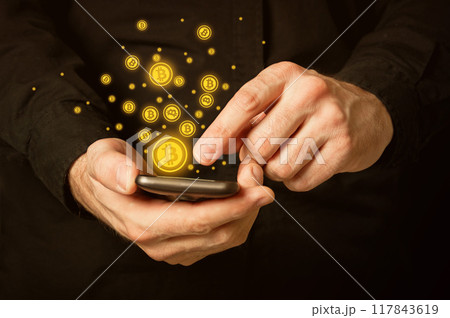 Bitcoins on smartphone Bitcoins on smartphone 117843619