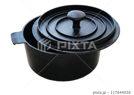 Cast iron used saucepan with open lid. Isolated on white background. Black pot. Used kitchen equipment. 117844038