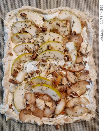 Unbaked savory tart Unbaked savory tart 117844396