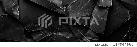Crumpled black paper banner with wrinkles and worn cracks. Old grunge cardboard web design element. Abstract dramatic background. Generative AI 117844669