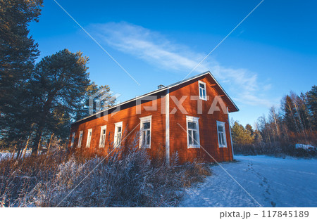 Cold winter day and old house. Sotkamo, Finland. 117845189