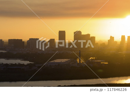 Urban sunset landscape of downtown district of Tampa city in Florida, USA. Dramatic skyline with high skyscraper buildings in modern american megapolis Urban sunset landscape of downtown district of Tampa city in Florida, USA. Dramatic skyline with high skyscraper buildings in modern american megapolis 117846226