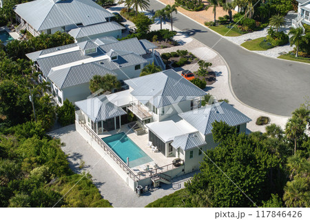 Rich neighborhood with expensive residential homes in Boca Grande, Florida. Wealthy suburban area 117846426