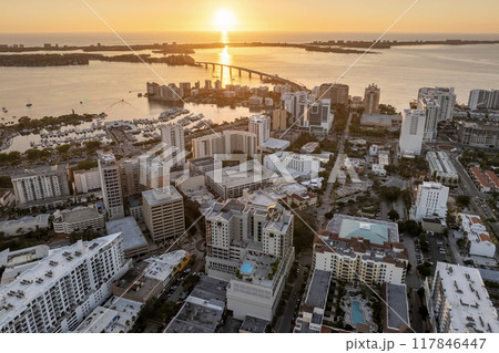 Sarasota, Florida city downtown at sunset with expensive waterfront high-rise buildings. Urban travel destination in the USA Sarasota, Florida city downtown at sunset with expensive waterfront high-rise buildings. Urban travel destination in the USA 117846447