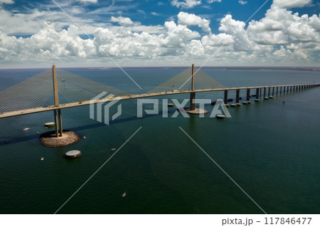 Sunshine Skyway Bridge over Tampa Bay in Florida with moving traffic. Concept of transportation infrastructure 117846477