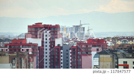 High rise residential apartment building in city residential area. Real estate development High rise residential apartment building in city residential area. Real estate development 117847577