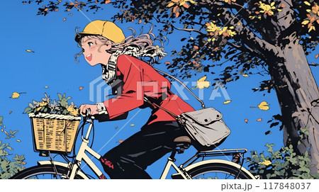 秋の景色：紅葉の小径を自転車を漕ぐ若い女性