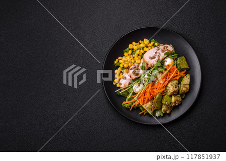 Fresh juicy salad with meat, mozzarella, carrots, lettuce, corn 117851937