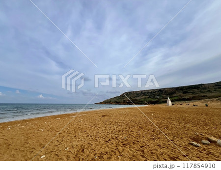 Beautiful sandy beach on the Coast of the island of Gozo, Malta. The Mediterranean Sea. 117854910