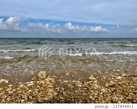 Beautiful sandy beach on the Coast of the island of Gozo, Malta. The Mediterranean Sea. 117854911