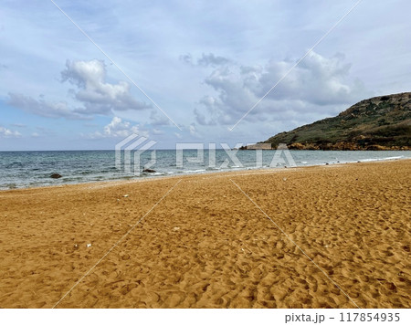 Beautiful sandy beach on the Coast of the island of Gozo. 117854935