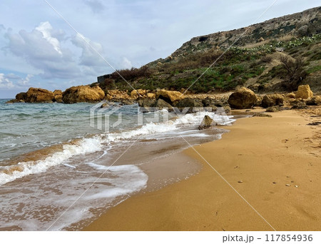 Beautiful sandy beach on the Coast of the island of Gozo. 117854936