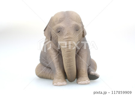 a Grey Plastic Toy Elephant Isolated on White Background. a Grey Plastic Toy Elephant Isolated on White Background. 117859909