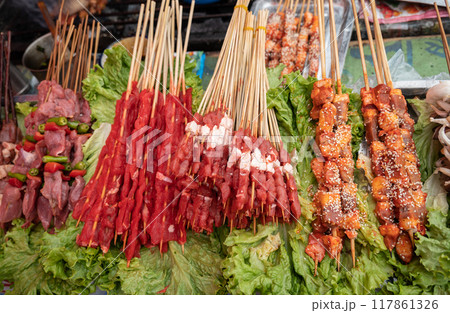 Yak skewer selling in local market in Shangri-la town of China. Yak meat is a high-protein and low-fat-containing food. 117861326