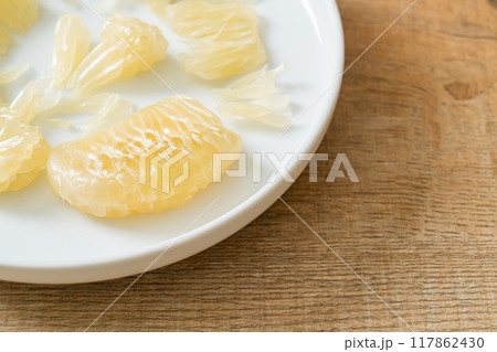 Fresh peeled pomelo, grapefruit or shaddock 117862430