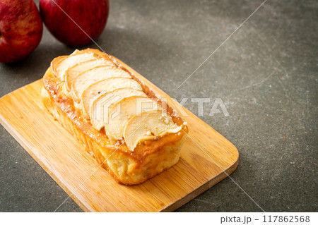 apple loaf crumbled on wood board apple loaf crumbled on wood board 117862568