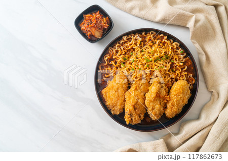 Korean instant noodles with fried chicken or Fried chicken ramyeon Korean instant noodles with fried chicken or Fried chicken ramyeon 117862673