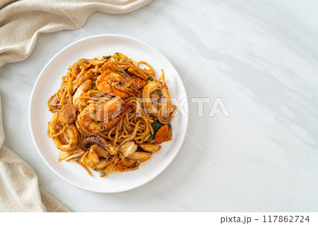 stir fried Tom Yum seafood dried spaghetti stir fried Tom Yum seafood dried spaghetti 117862724