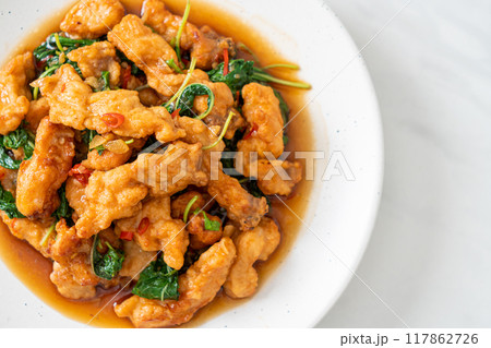 stir-fried fried fish with basil and chili in thai style 117862726
