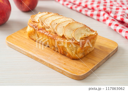apple loaf crumbled on wood board apple loaf crumbled on wood board 117863062