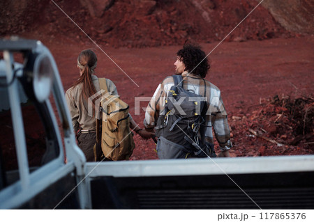 Two young travelers with backpacks Two young travelers with backpacks 117865376