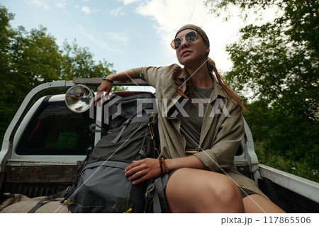 Enjoying ride during hitchhiking trip 117865506