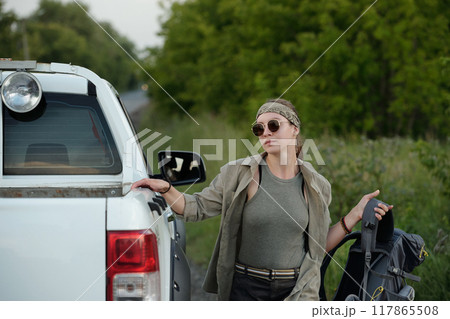Active woman getting to pickup truck Active woman getting to pickup truck 117865508