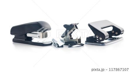 Office equipment. Stapler, staple remover and hole puncher isolated on white background. 117867107