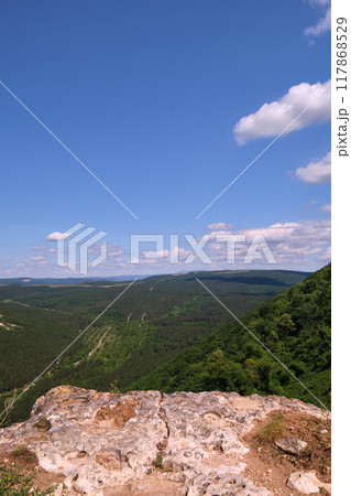 Mountain landscape with white clouds 117868529