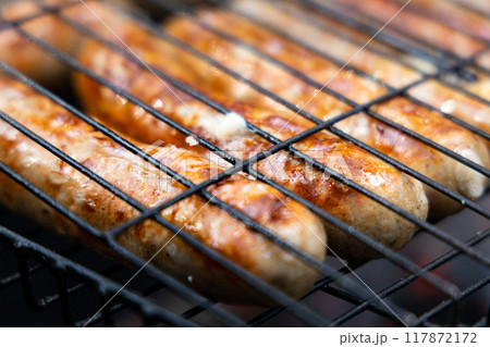 Sizzling Sausage Symphony on a Summer Grill Sizzling Sausage Symphony on a Summer Grill 117872172