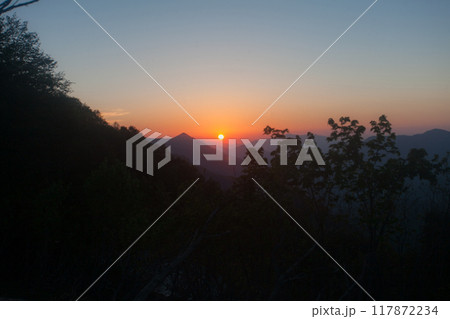 Mountain Sunrise Over a Misty Valley 117872234