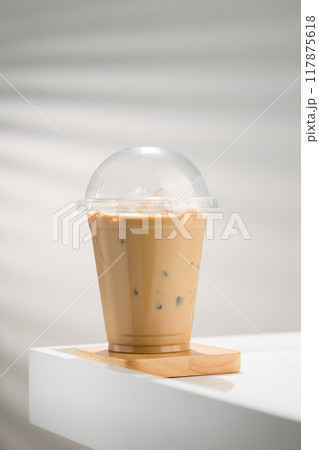 Iced coffee with milk. 117875618