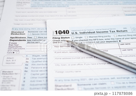 Tax form 1040 U.S. Individual Income Tax Return, business finance concept. 117878086