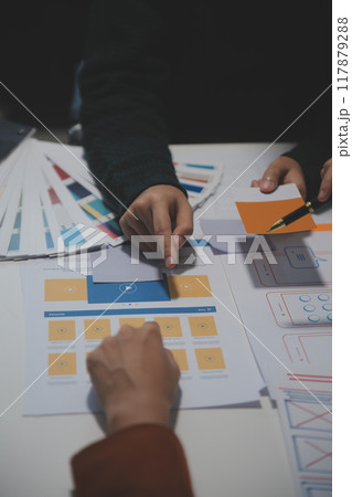 Professional interior designer at workplace in office, closeup 117879288