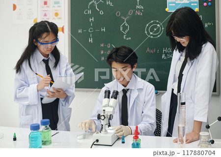 Students Conducting Science Experiment in Laboratory Students Conducting Science Experiment in Laboratory 117880704