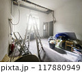 Interior Room Under Renovation with Debris and Tools 117880949