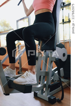 Fit Legs Of A Woman In The Gym Training Fit Legs Of A Woman In The Gym Training 117882875