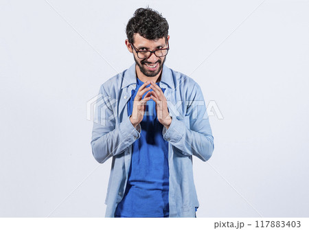 Cunning man rubbing his hands on isolated background, person rubbing his hands planning something, concept of cunning man planning something 117883403