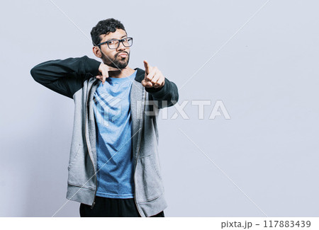 Person threatening with the finger in the throat, A person threatening death, A man with a violent look making threatening signs Person threatening with the finger in the throat, A person threatening death, A man with a violent look making threatening signs 117883439